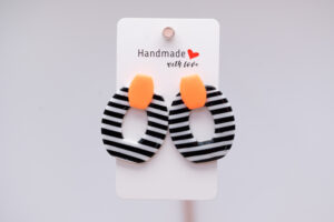 Boucles d'oreilles orange fluo Rayées noir et blanc