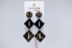 Boucles d'oreilles pendantes noires et dorées