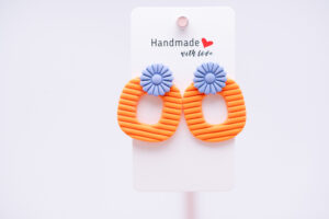 Boucles d'oreilles double texture orange et fleur